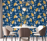 Dining room wall in Lemon Orchard wallpaper with yellow fruit