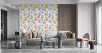 Modern Pastel Daisy Pebbles Wallpaper with blue, pink, yellow, and green tones