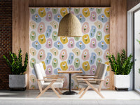 Soft floral Pastel Daisy Pebbles Wallpaper showing pastel pebble background