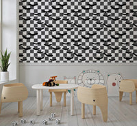 Play area wall finished with woodland mushroom wallpaper in earthy tones