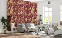 Hallway shows burgundy bird wallpaper with pale blossoms and fine leaves