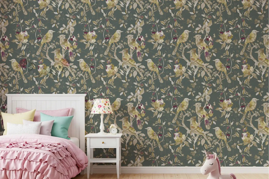 Girls room finished with green botanical bird wallpaper and pale blossoms