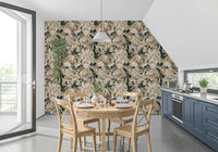 Dining room finished with gold floral wallpaper on deep green base