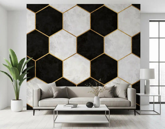 Hexagon wall mural in black, white and gold framing a modern living room space