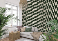 Geometric chevron crest pattern in forest green tones lining the living room walls
