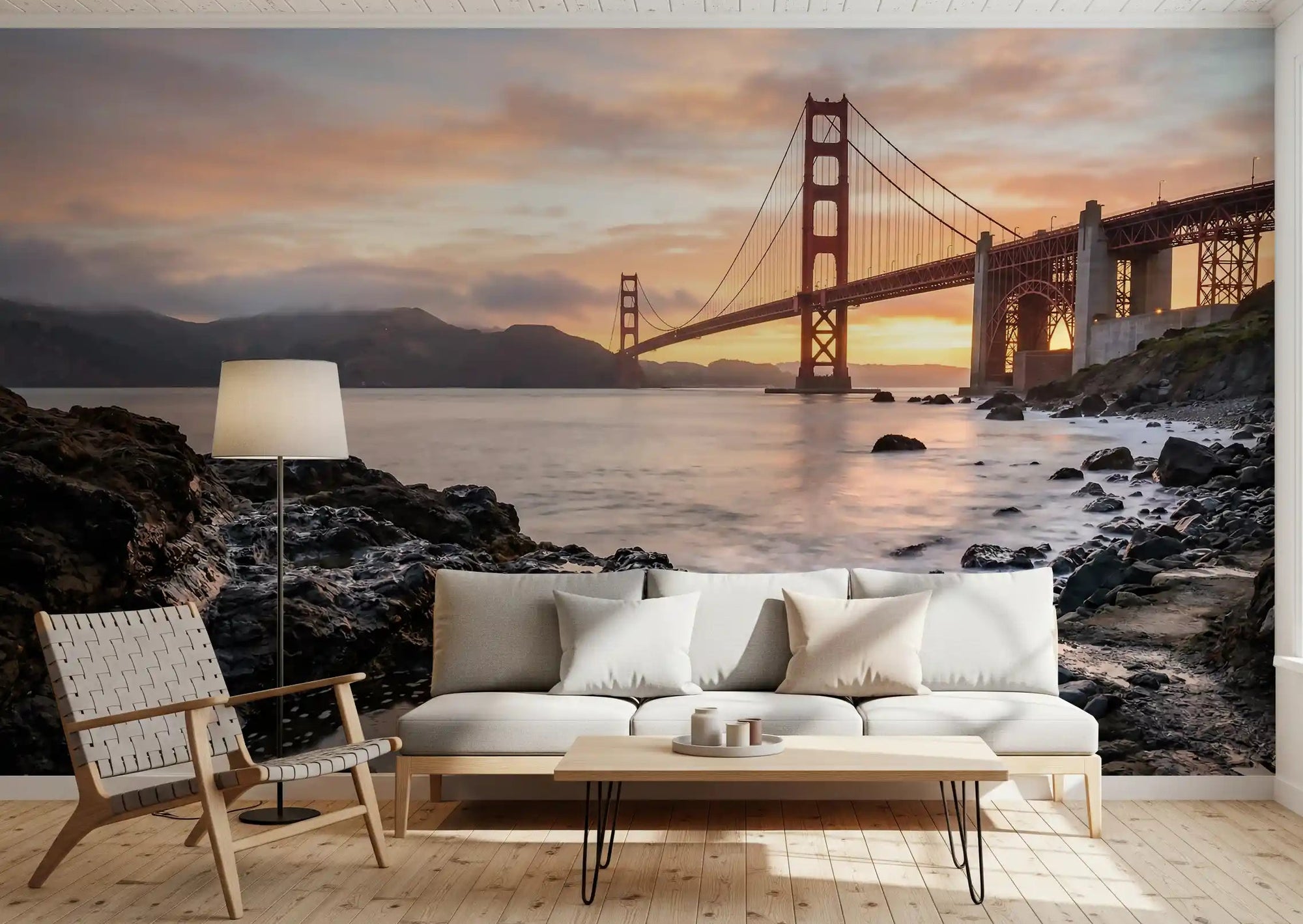 Golden Gate Bridge wall mural spanning the living room from corner to corner in sunset tones