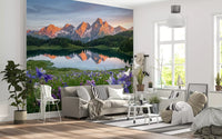 Mountain lake reflection wall mural in a bright modern living room