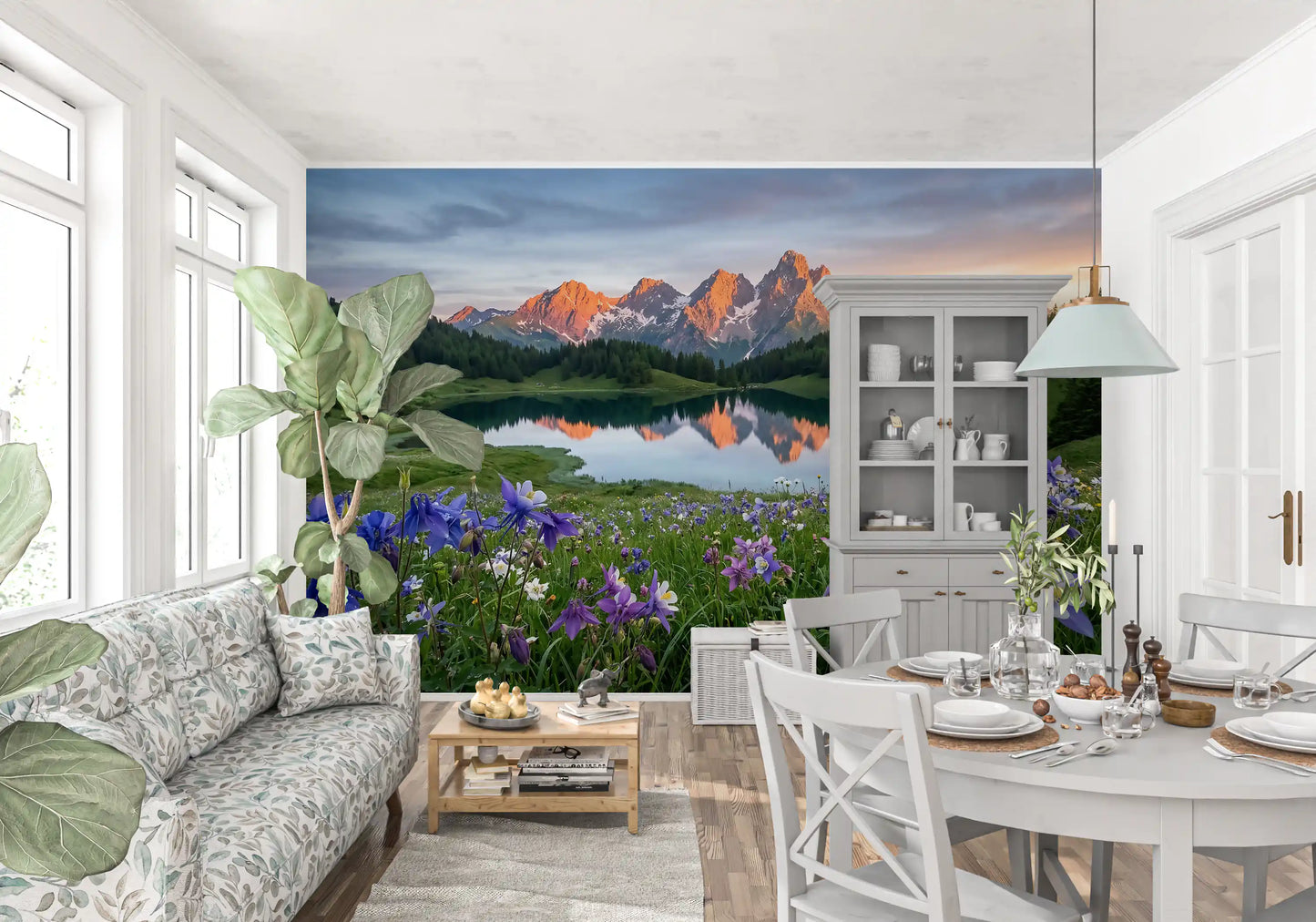 Snow-capped mountain peaks glowing orange in the alpine reflection wall mural