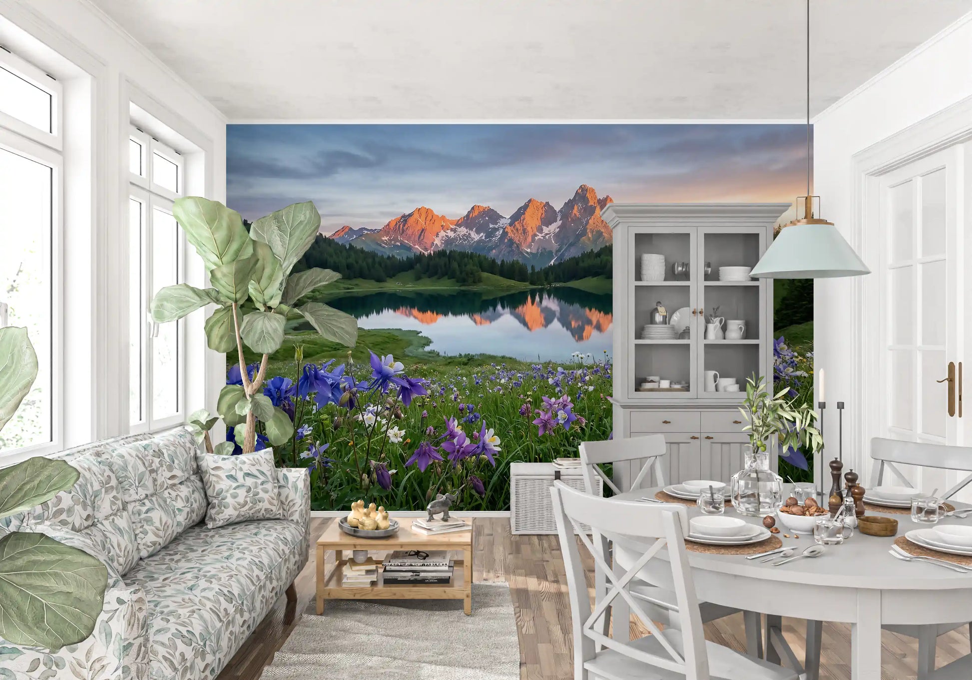 Snow-capped mountain peaks glowing orange in the alpine reflection wall mural