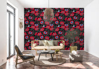 Hand-illustrated red blooms paired with blue butterflies on dark floral wallpaper