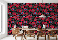 Close pattern view of red roses, butterflies, and veined leaves on wallpaper