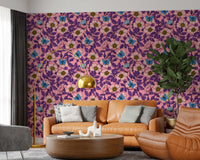 A pink ground supports blue butterflies and dog rose blooms in this hand-drawn floral wallpaper