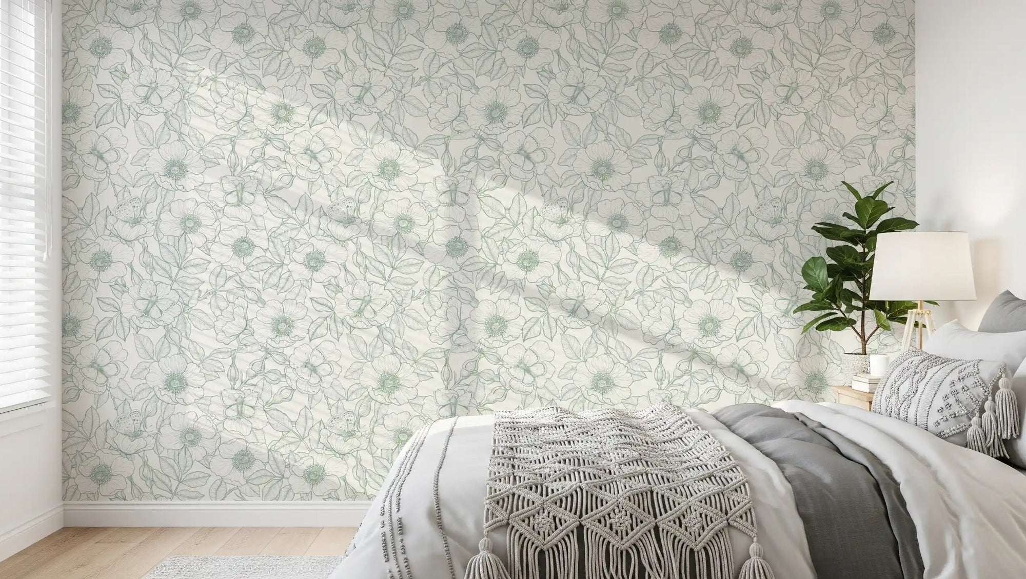 Bedroom dressed in Dog Rose and Butterflies green linework wallpaper