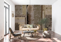 Minimalist lounge interior featuring a distressed collage wall mural.