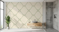 Sage dots on cream keep a small bathroom feeling fresh with this wallpaper