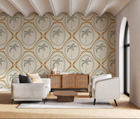 Relaxing living room highlighting this beachy green and golden wallpaper.