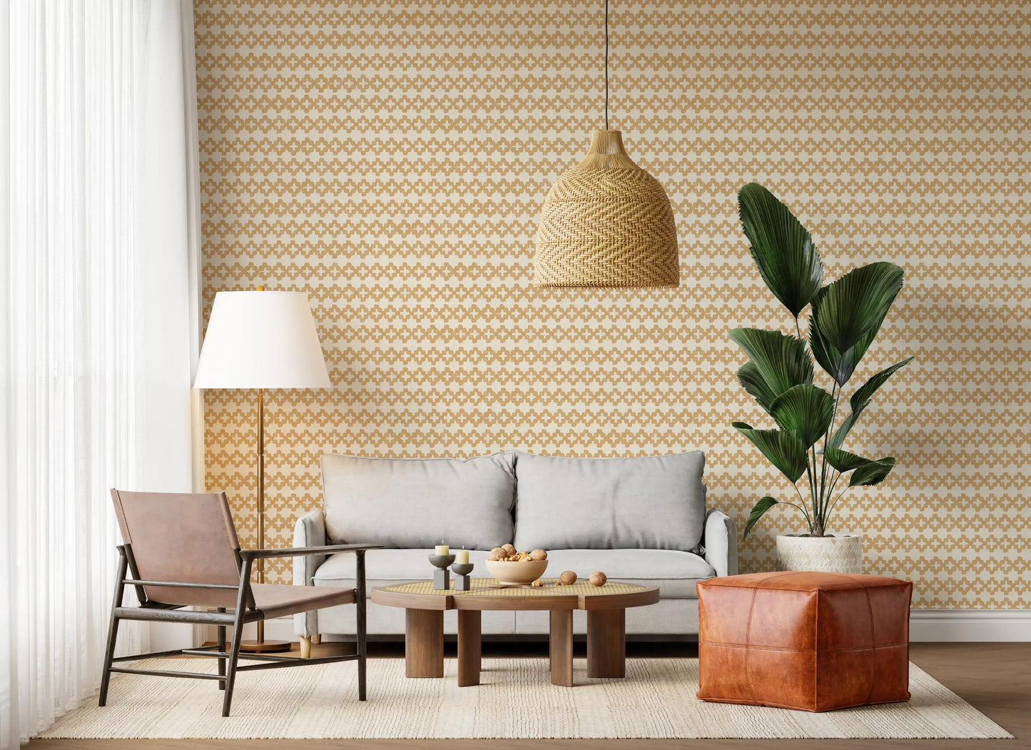 A bright living room layered with warm Zellige Cross Sand wallpaper tones.