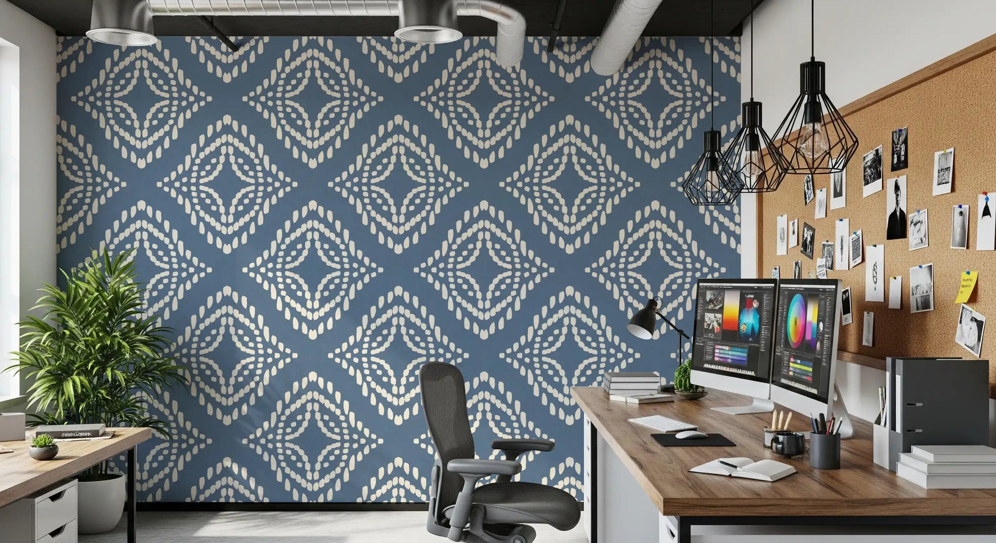 Ivory beadwork spreads outward in even rings on this slate blue ornament wallpaper