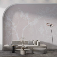 Tree shapes recede into a misty backdrop on this Blossom Canopy wall mural