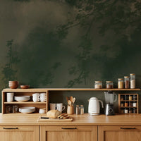 Deep forest greens fade into smoky olive in this moody wall mural