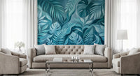 Layered palm and fern shapes calm a Living room with a teal tropical wall mural