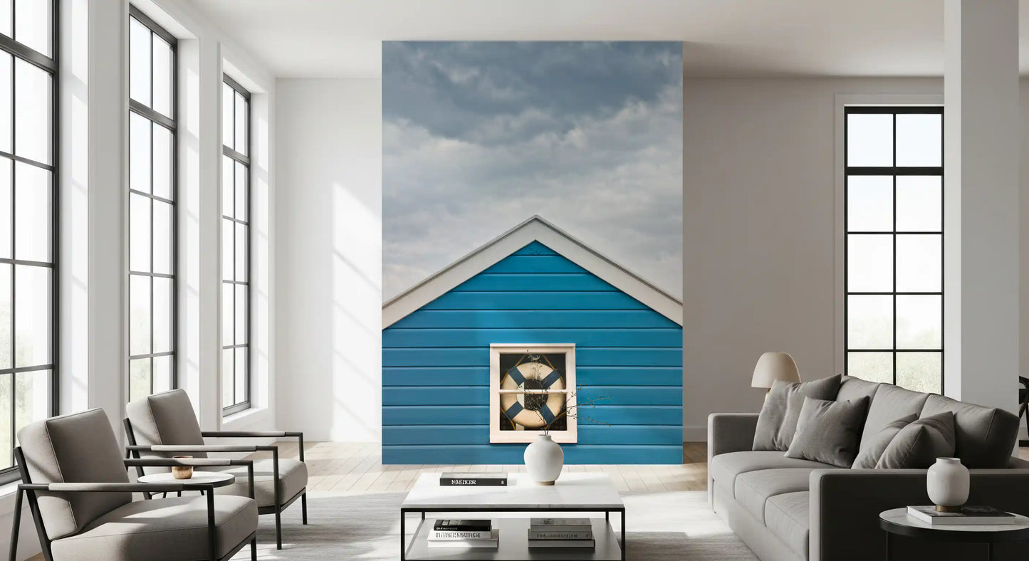 Blue Beach Hut wall mural detailing a life ring set in a small window