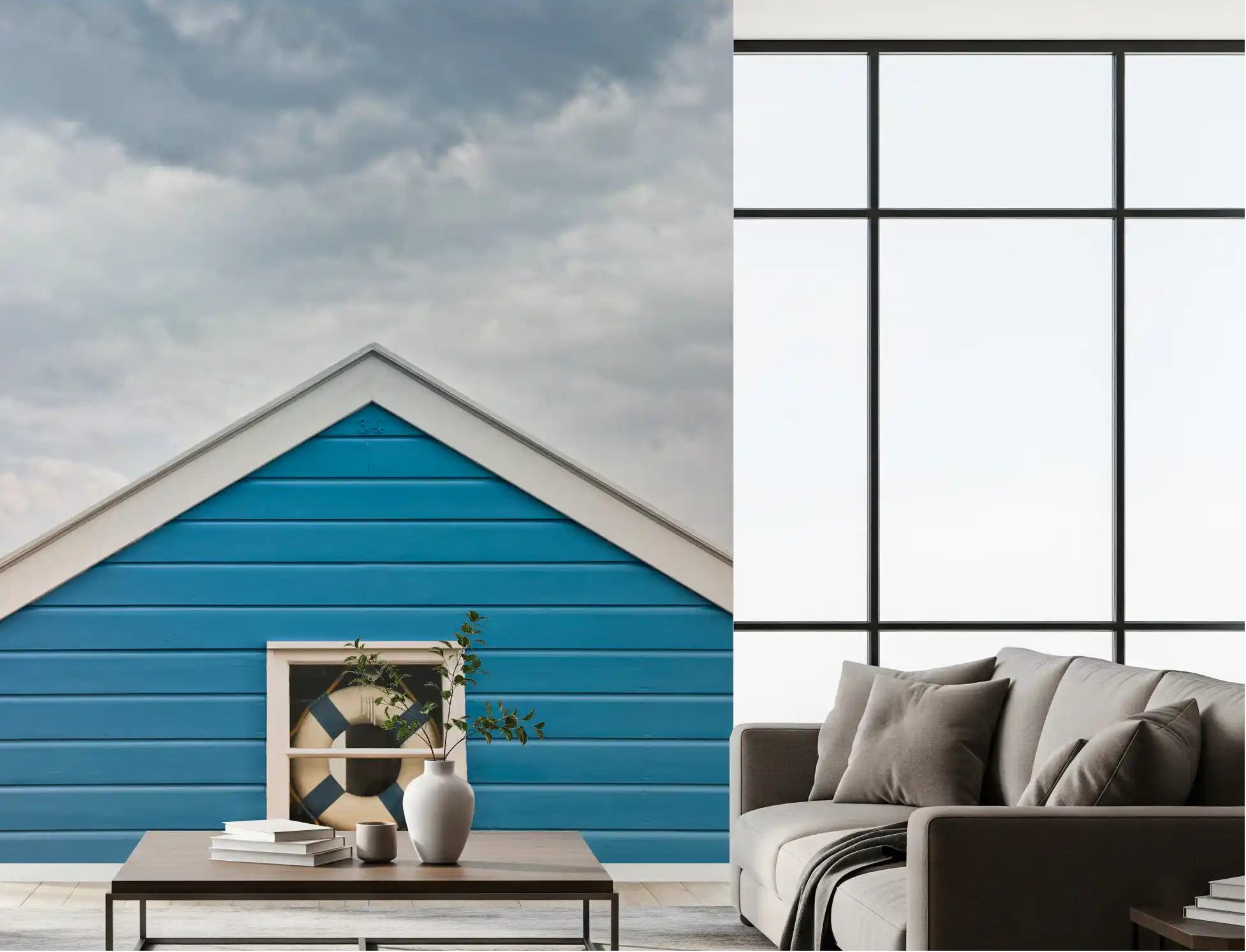 Breezy coastal mood fills a living room with the Blue Beach Hut wall mural