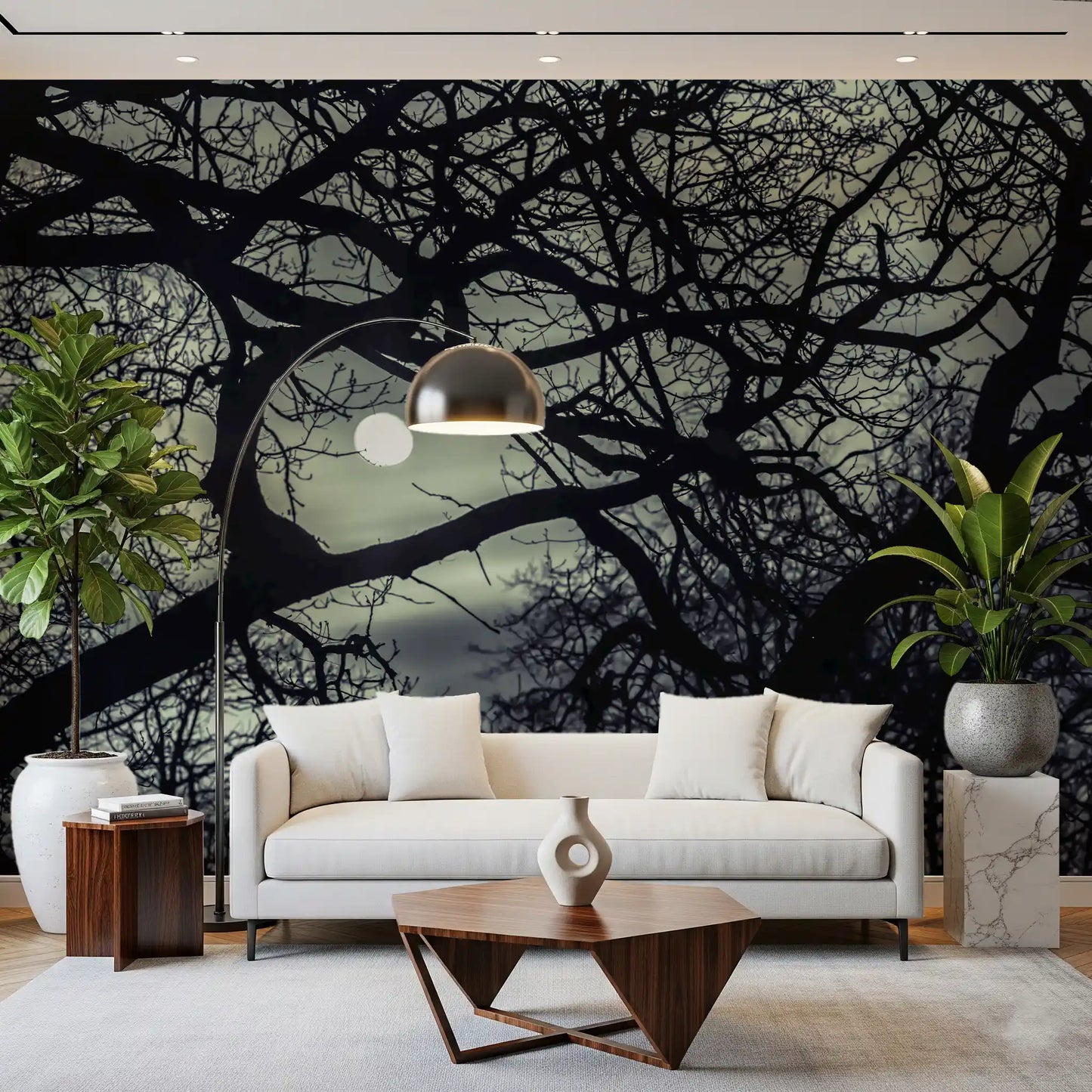 Living room gathers gothic mood from the Midnight Branches wall mural and its dark twigs.