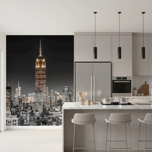 The Empire Glow: NYC Night in Grayscale Gold wall mural updates a modern kitchen.