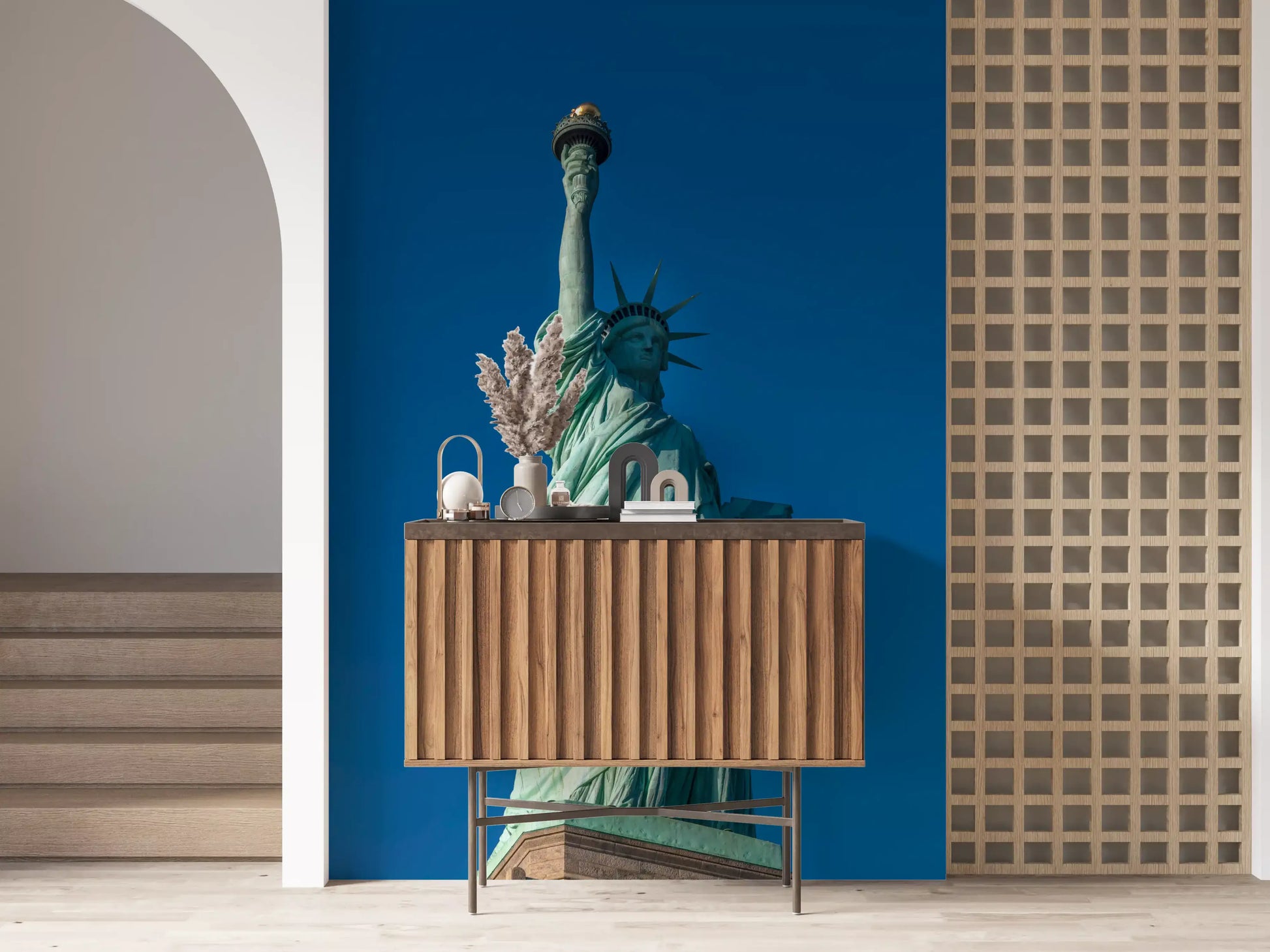 Open sapphire sky of Liberty's Azure Grace wall mural surrounds the figure cleanly