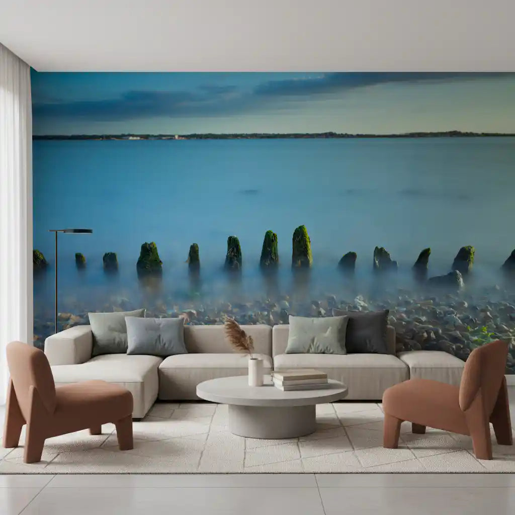 Misty water and pale dusk sky meet in this Ethereal Coastline wall mural arrangement.