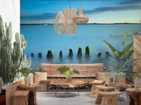 Quiet low-light seascape feel pairs with a Dining room Ethereal Coastline wall mural look.