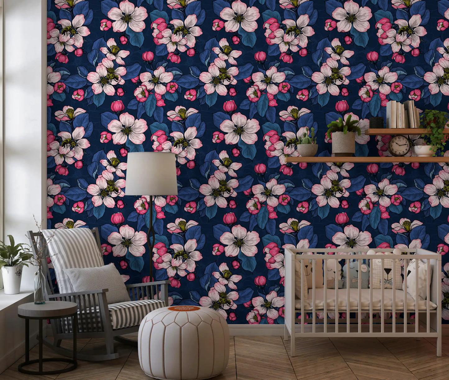 Delicate green leaves frame vibrant blossoming buds across the dark wallpaper surface