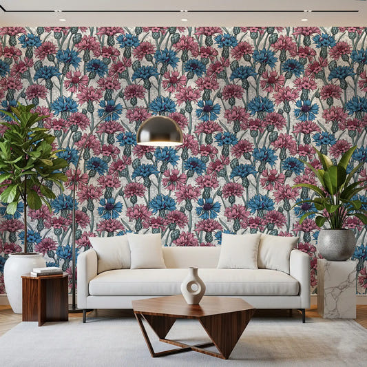 Living rooms feel fresh with the pink and blue cornflowers on white wallpaper.