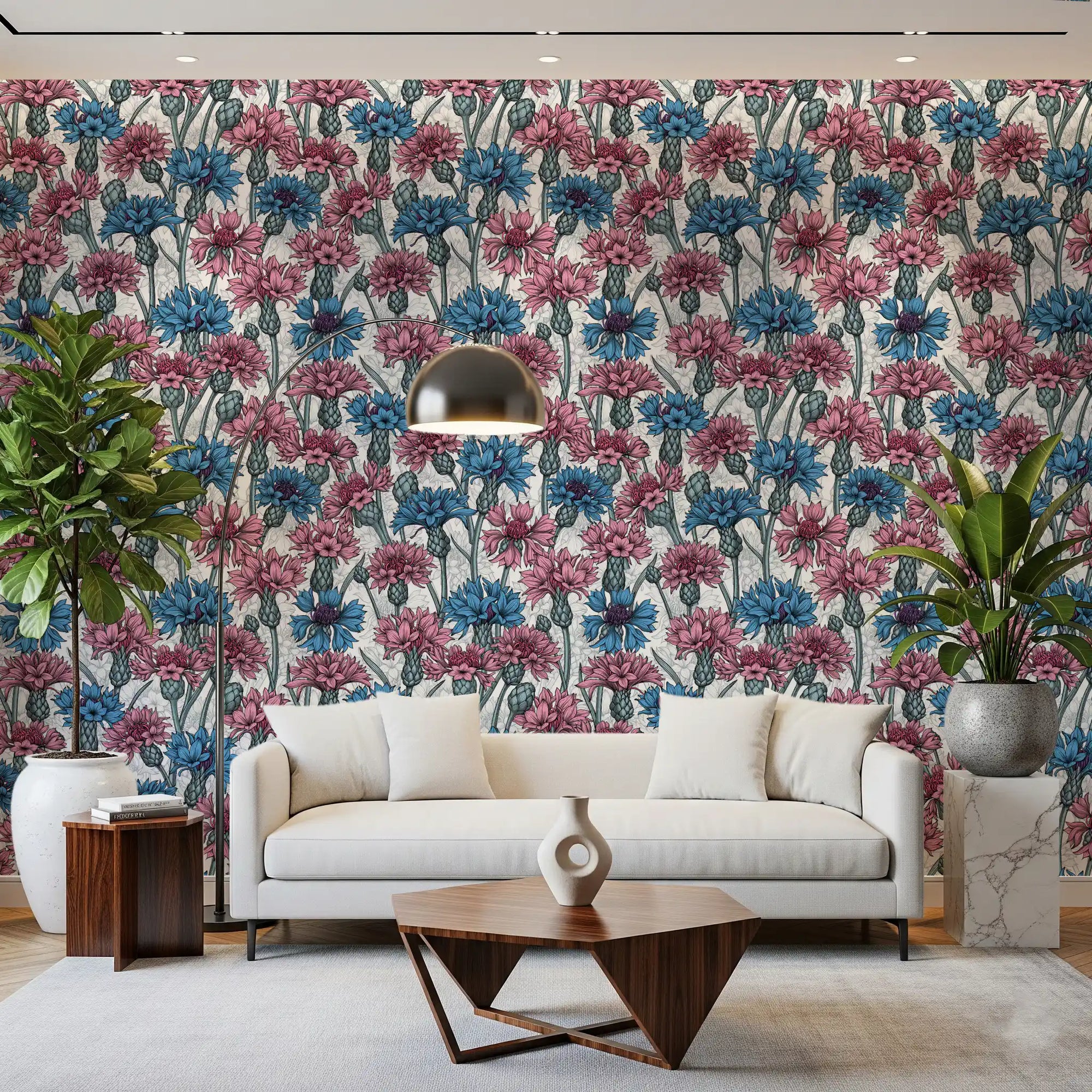 Living rooms feel fresh with the pink and blue cornflowers on white wallpaper.