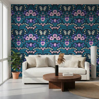 Daylight illuminates the vibrant Dollhouse garden wallpaper in this spacious living room.