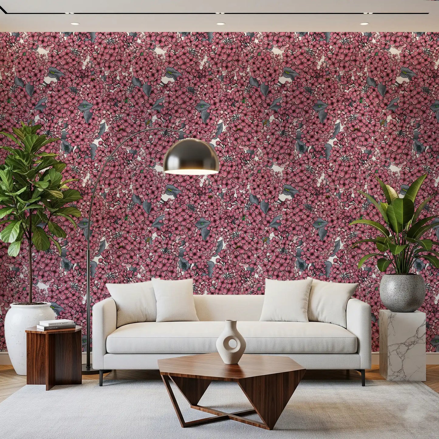 A bright Living room utilizes the bold botanical Pink Lilac wallpaper for depth.