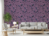 Floral patterns cover the entryway featuring this Violet Lilac garden wallpaper.