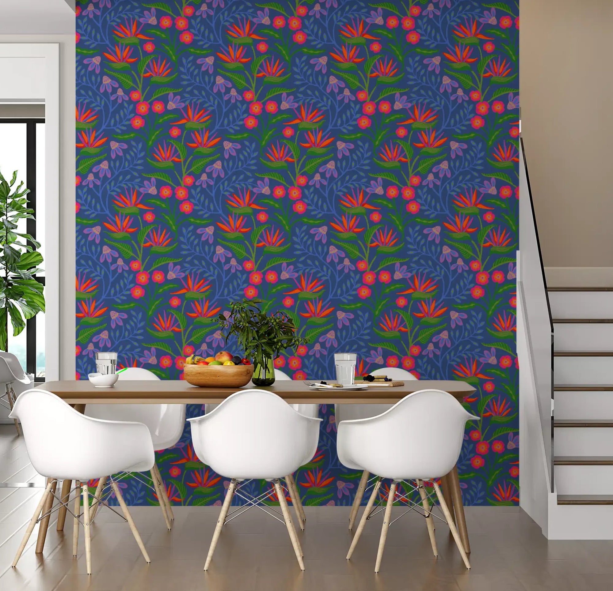 Tropical Tangle Floral Bird of Paradise Fuchsia Pink Blue Wallpaper fills the dining room.