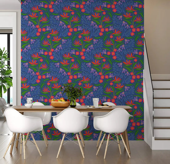 Tropical Tangle Floral Bird of Paradise Fuchsia Pink Blue Wallpaper fills the dining room.