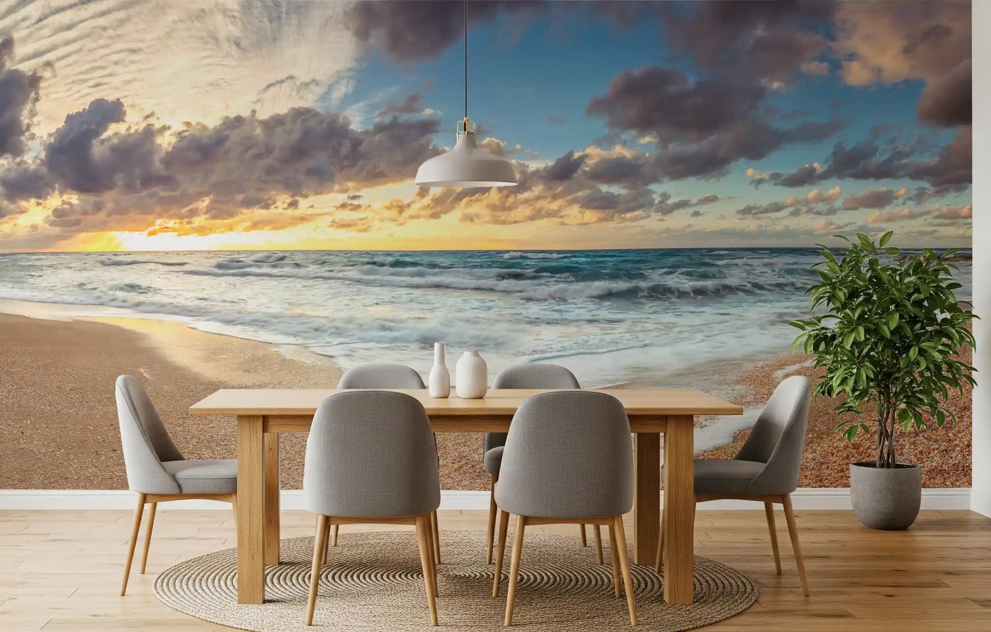 Sunset warmth spreads through the Dining room with a Golden Shoreline wall mural backdrop.