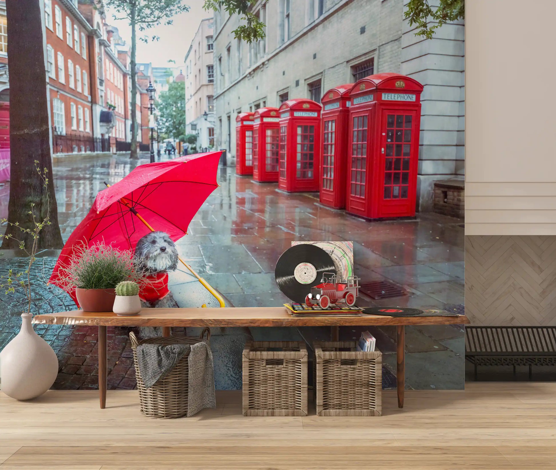 A scruffy terrier sits on wet paving holding a red umbrella in this Puddle Pal's Tale wall mural.