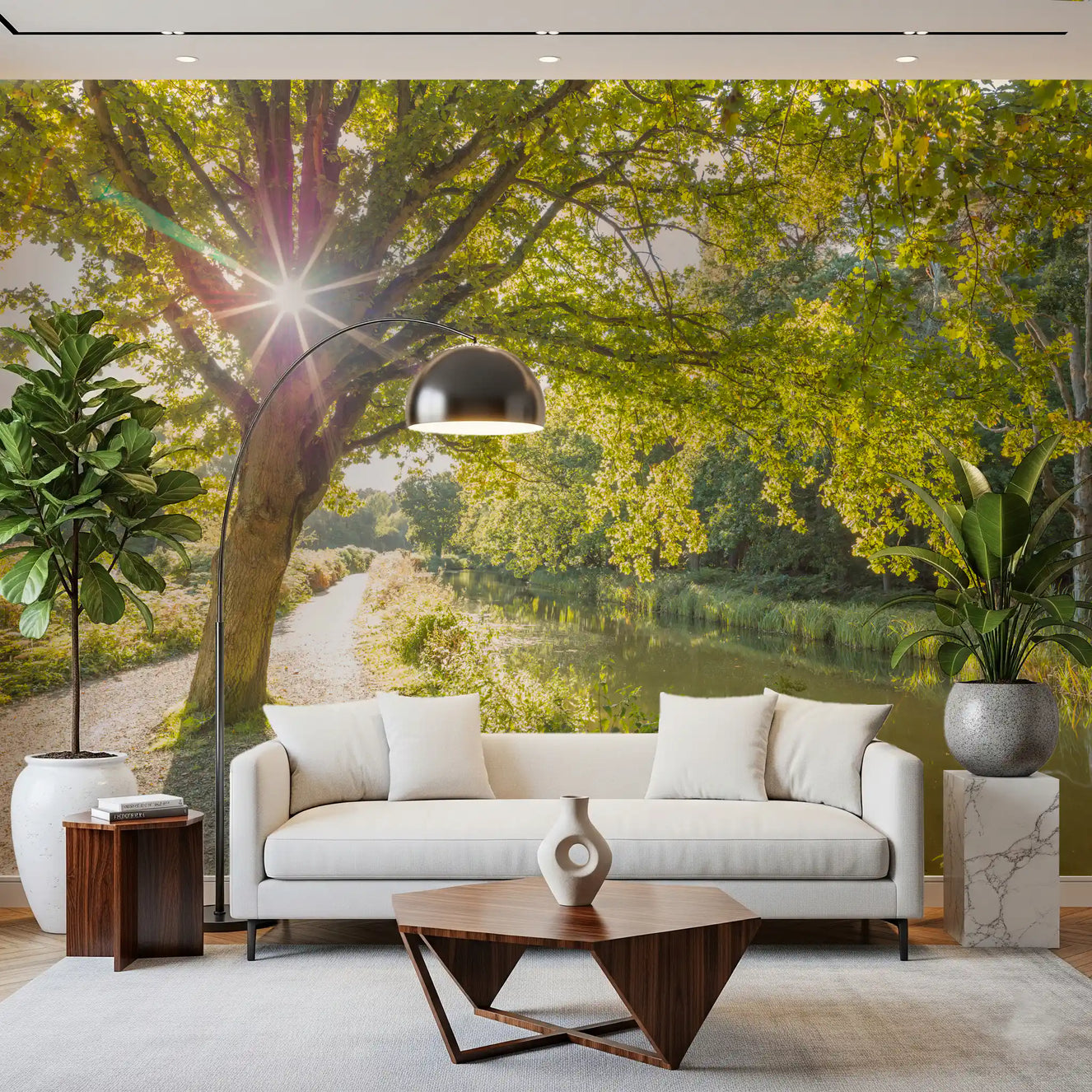 Sunlit Woodland Canal wall mural opens the living room with oak-tree canopy light.