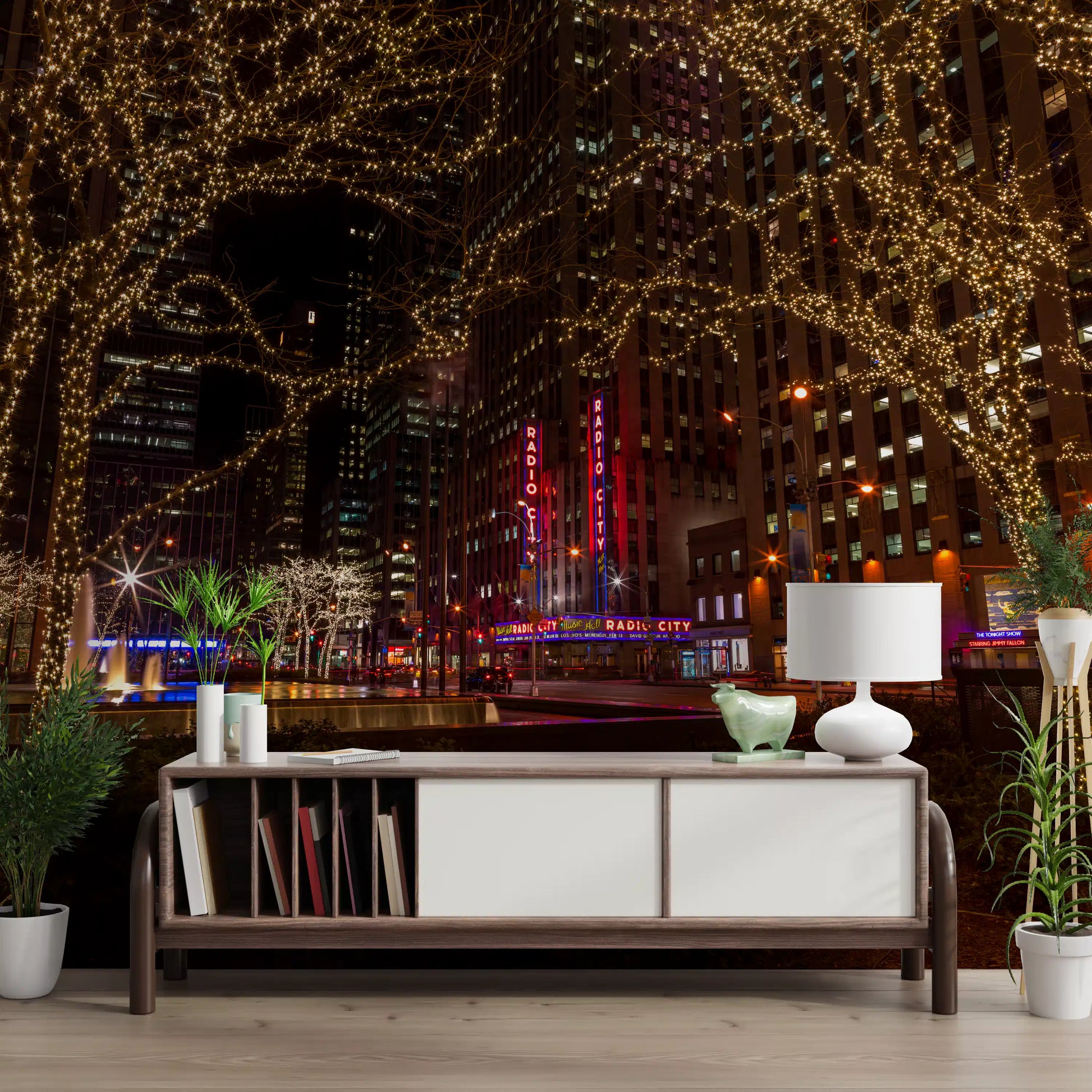 Twin avenues of light-strung trees frame the Radio City Night Glow wall mural scene