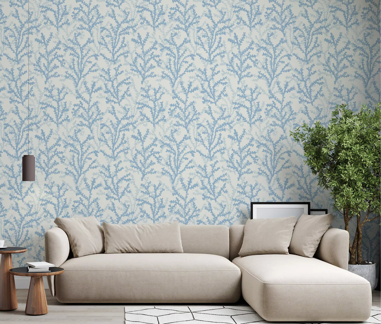 Coral sprigs from Painted Coraline Dreaming Blue wallpaper add charm to a living room.