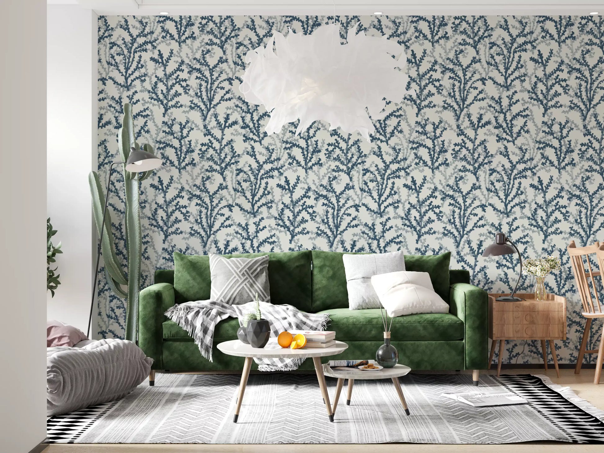 Two layers of branches build up in the Coraline Teal wallpaper field