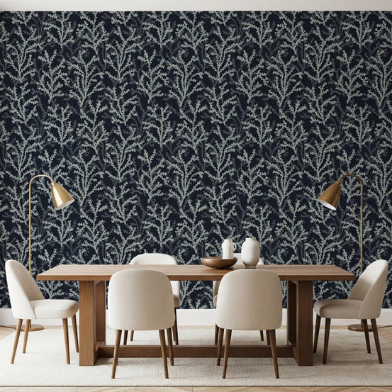 Marine motifs of the Painted Coraline Greenish Grey Dark Wallpaper populate a dining room.