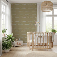 Wave pattern wallpaper with muted green surface and airy seaside rhythm