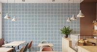 Cafe area wall featuring Grid Wallpaper with cream lines and soft blue color