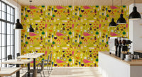 Food motif wallpaper on a mustard background with bright garden forms